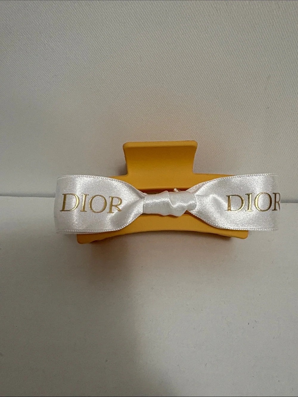 Dior Luxurious white and Gold Ribboned Hair Clip